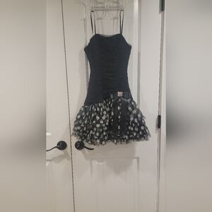 Juniors size 7 black dress with white polka dots.